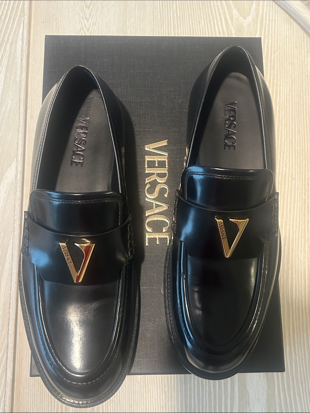 Versace Black Leather Slip-On Loafers with Gold V Emblem